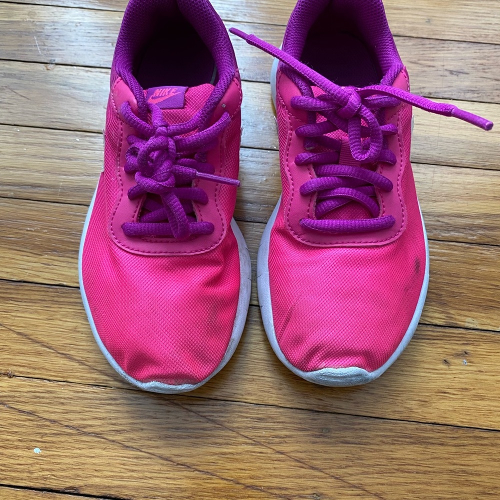 Girls pink and purple Nike sneakers